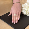 Woman holding a velvet box with citrine gemstone silver ring inside