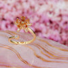 Adjustable Gold Floral Spinner Ring – Elegant Stress Relief Jewelry with High-Quality Peach Cubic Zirconia