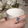 Blue Cubic Zirconia Flower Spinner Ring β Adjustable Silver-Tone Statement Ring for Women