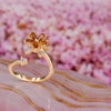 Adjustable Gold Floral Spinner Ring – Elegant Stress Relief Jewelry with High-Quality Peach Cubic Zirconia