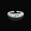 Front view of celestial silver ring with constellation design and cubic zirconia stones