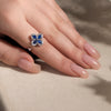 Blue Cubic Zirconia Flower Spinner Ring β Adjustable Silver-Tone Statement Ring for Women