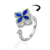 Blue Cubic Zirconia Flower Spinner Ring β Adjustable Silver-Tone Statement Ring for Women