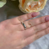 Close-up of celestial ring on finger – minimalist design with sparkle
