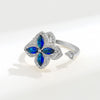 Blue Cubic Zirconia Flower Spinner Ring β Adjustable Silver-Tone Statement Ring for Women