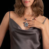 The back of the pendant features a smooth, polished surface, giving the wearer comfort and versatility. Made from 925 sterling silver, it offers durability while maintaining a luxurious, timeless appeal. Whether worn daily or for special occasions, it serves as a reminder of strength and resilience.