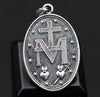 In this image, the Miraculous Medal Pendant is shown in close-up detail, emphasizing the craftsmanship of the intricate design. Made from high-quality 925 sterling silver, the pendant highlights the beauty of traditional religious symbols with its immaculate detailing. This pendant, with its unique handcrafted nature, is a timeless piece of Catholic devotional jewelry that stands on its own. Perfect for personal wear or as a thoughtful religious gift, it’s ideal for spiritual celebrations, such as baptisms