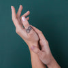 The final photo highlights the robust construction of the snake ring, made from high-quality 925 sterling silver for long-lasting wear. This piece is designed to withstand the test of time, making it perfect for daily wear. Its durable craftsmanship combined with the striking snake motif offers a blend of strength and elegance, ideal for those who value quality jewelry.