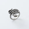 This sterling silver snake ring is the perfect blend of elegance and gothic design. Handcrafted with intricate details, the serpent wraps gracefully around your finger. Made from 925 sterling silver, it's a durable and unique piece for men and women.