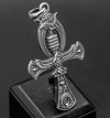 A close-up of the Eye of Horus, which is meticulously crafted above the Ankh. The Eye of Horus is known to symbolize protection, royal power, and good health in ancient Egyptian mythology. This detailed shot showcases the fine lines and intricate work of the pendant, perfect for those seeking a deeper connection with Egyptian mythology through their jewelry.