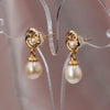 Handcrafted pearl earrings with gold roses, bridal or special occasion jewelry