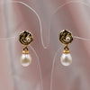 Baroque pearl earrings with gold flower design, delicate handmade accessory
