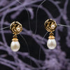 Baroque pearl earrings with gold flower design, delicate handmade accessory