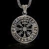 This stunning Viking Vegvisir Pendant, crafted from high-quality 925 sterling silver, showcases the ancient Norse compass symbol, believed to guide the wearer through life’s challenges. The intricate detailing of the Vegvisir makes it both a protective amulet and a meaningful accessory for lovers of Norse mythology. This handcrafted piece is perfect for men and women who seek a connection to Viking heritage.