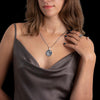 Three wolves and moon pendant worn by woman, silver animal totem necklace for gift giving