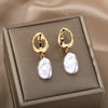 Gold dangle earrings with natural freshwater baroque pearls – elegant bridal or bridesmaid gift idea