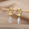 Statement earrings with large baroque pearls and gold irregular studs – unique handmade-style bridal jewelry