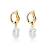 Minimalist baroque pearl dangle earrings with sculptural gold base – perfect for brides or everyday elegance