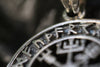 The side view of the Vegvisir Pendant shows the impressive depth and thickness of this handcrafted piece. The polished sterling silver paired with the deep engraving of the Viking compass symbol creates a balance of elegance and ruggedness. Designed to be worn daily, this pendant serves as both a striking accessory and a powerful Norse protection amulet.