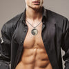 Masculine wolf pendant necklace in sterling silver, strong animal symbol jewelry worn by male model