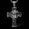 Front view of INRI cross pendant with detailed face of Jesus Christ, handcrafted in 925 sterling silver on black background