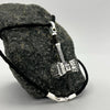 Close-Up of Viking Thor Hammer Pendant – Oxidized Silver Norse Amulet Necklace with Textured Black Cord