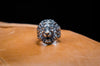 An inside view of the lion head ring, showing the smooth and polished interior that ensures comfort during wear. Despite its bold design and significant weight (15-16 grams), this ring provides a snug fit without compromising style. Crafted from sterling silver with an oxidized finish, it’s designed to last, offering both durability and timeless appeal. Perfect for men who want a blend of comfort and style in their statement jewelry.